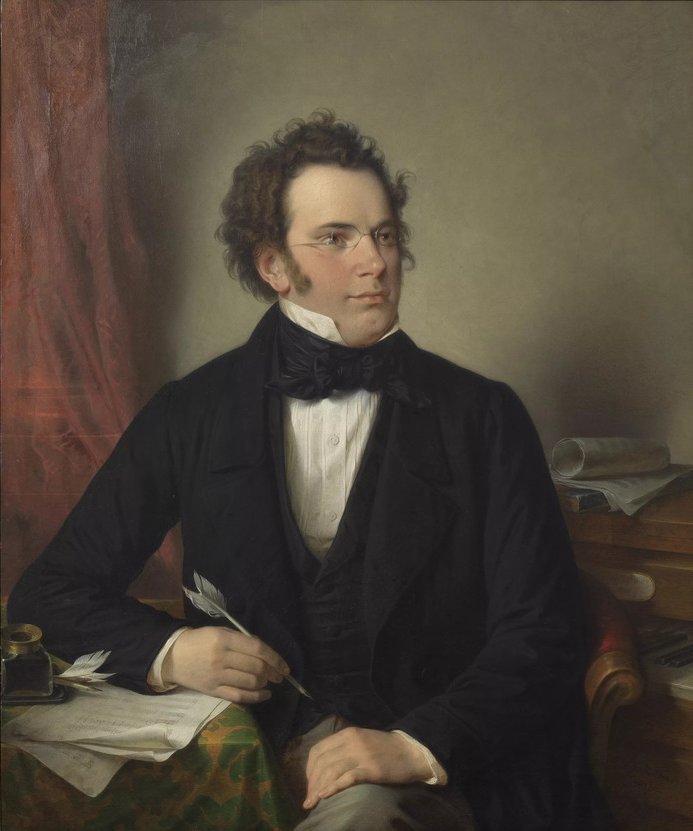 Gemälde: Franz Schubert im Anzug sitzt am Schreibtisch, mit Feder in der Hand, zur Seite blickend.