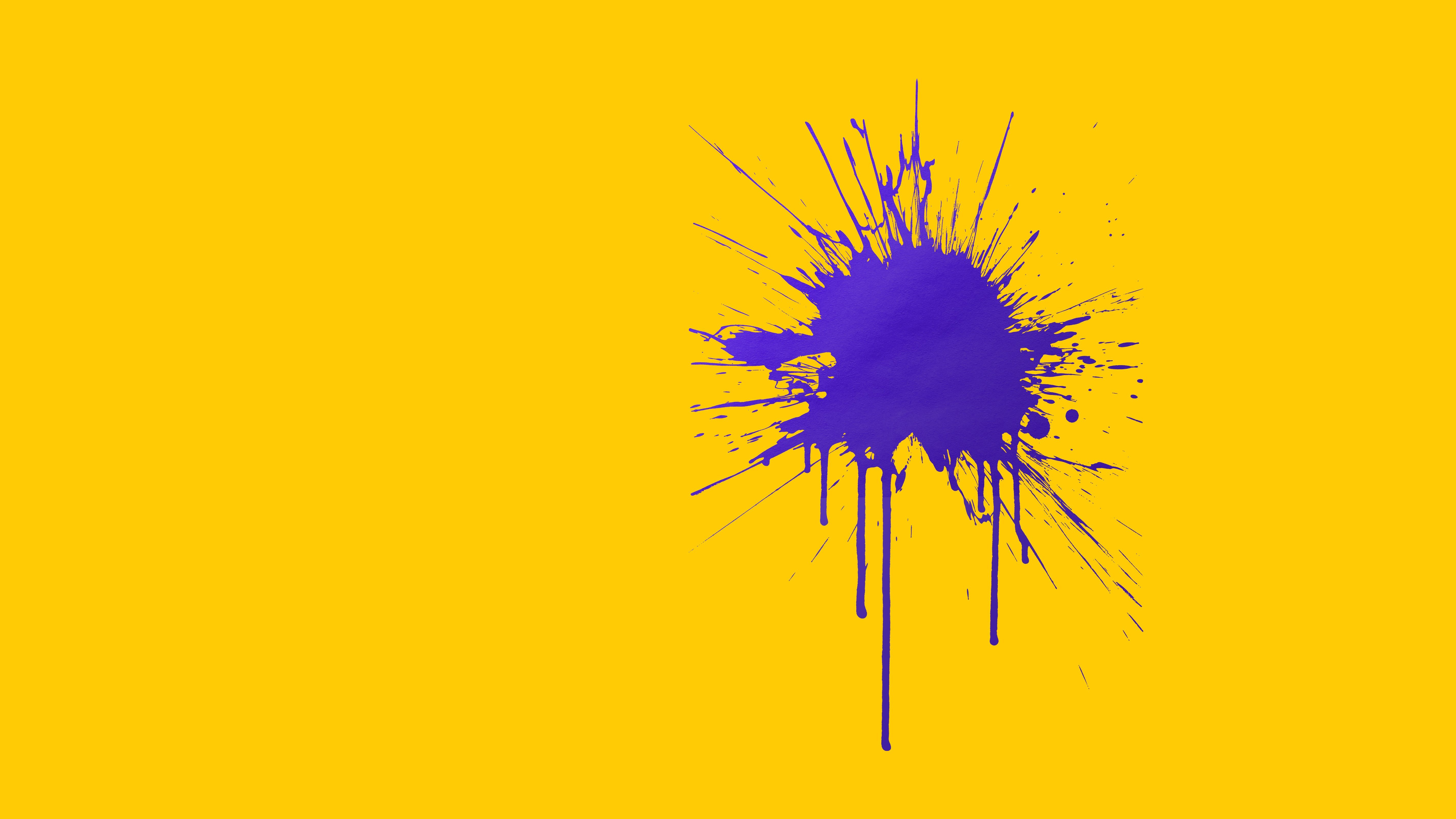 A bold purple paint splatter with drips spreads out on a bright yellow background, creating a striking contrast with ample empty space on the left side of the image.