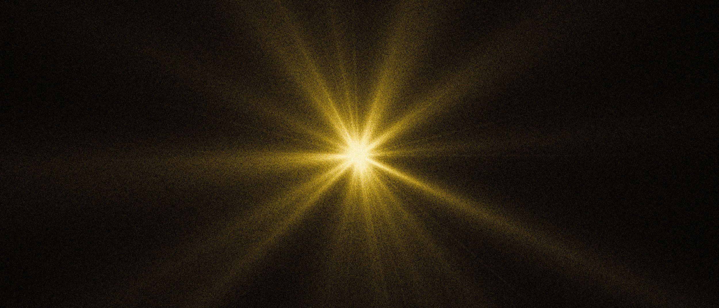 Ein heller, goldgelber Lichtstrahl strahlt von der Mitte aus vor einem dunklen Hintergrund und erzeugt leuchtende Strahlen, die ein sternförmiges Muster bilden.