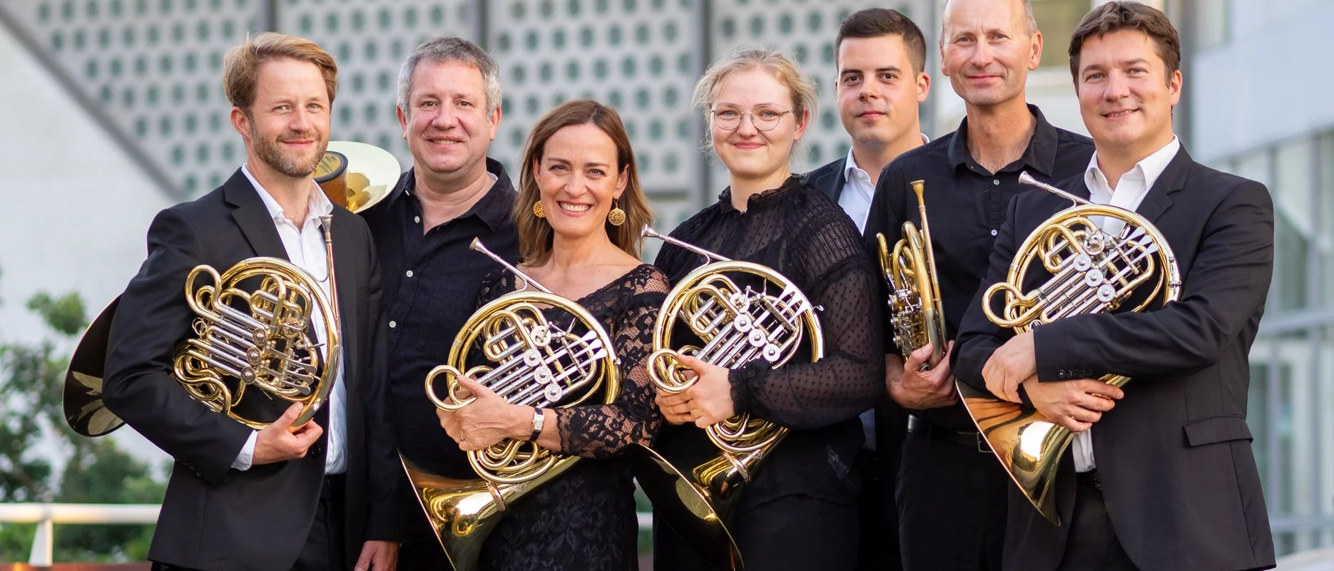 Group photo with seven horn players