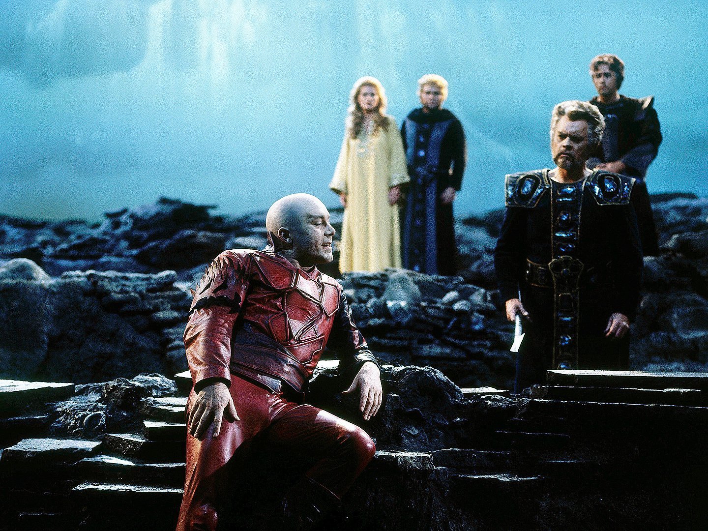 Scene from Wagner’s opera Das Rheingold with singers on stage.