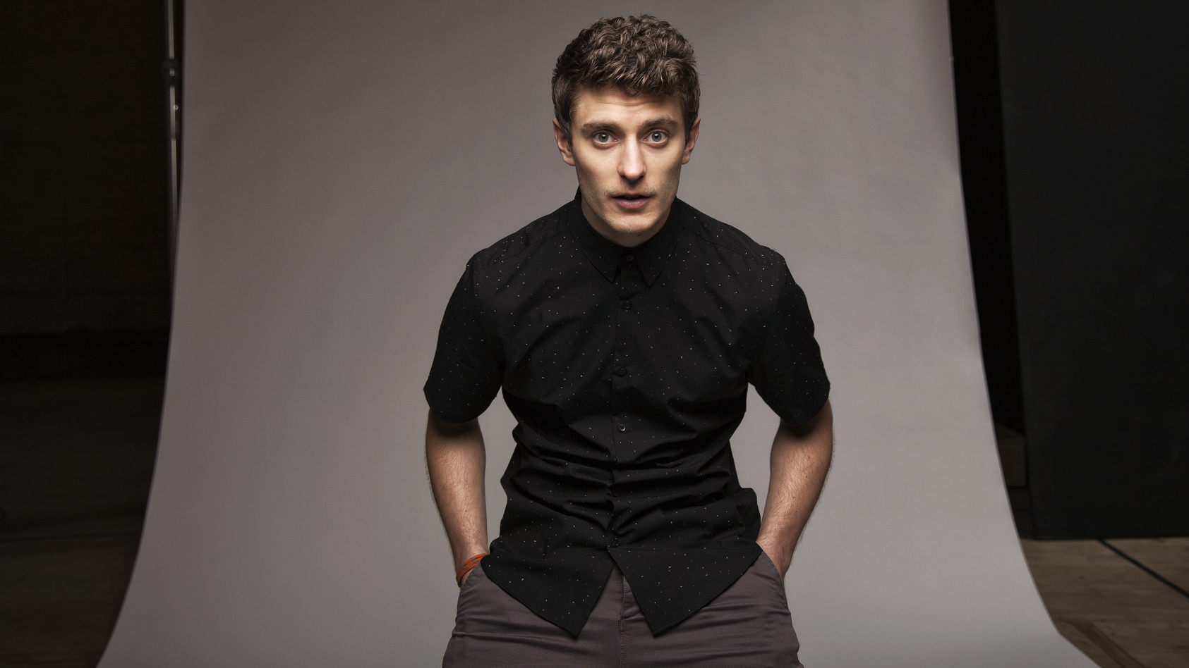 Portrait photo of Jakub Józef Orliński. He is wearing a black turtle-neck.