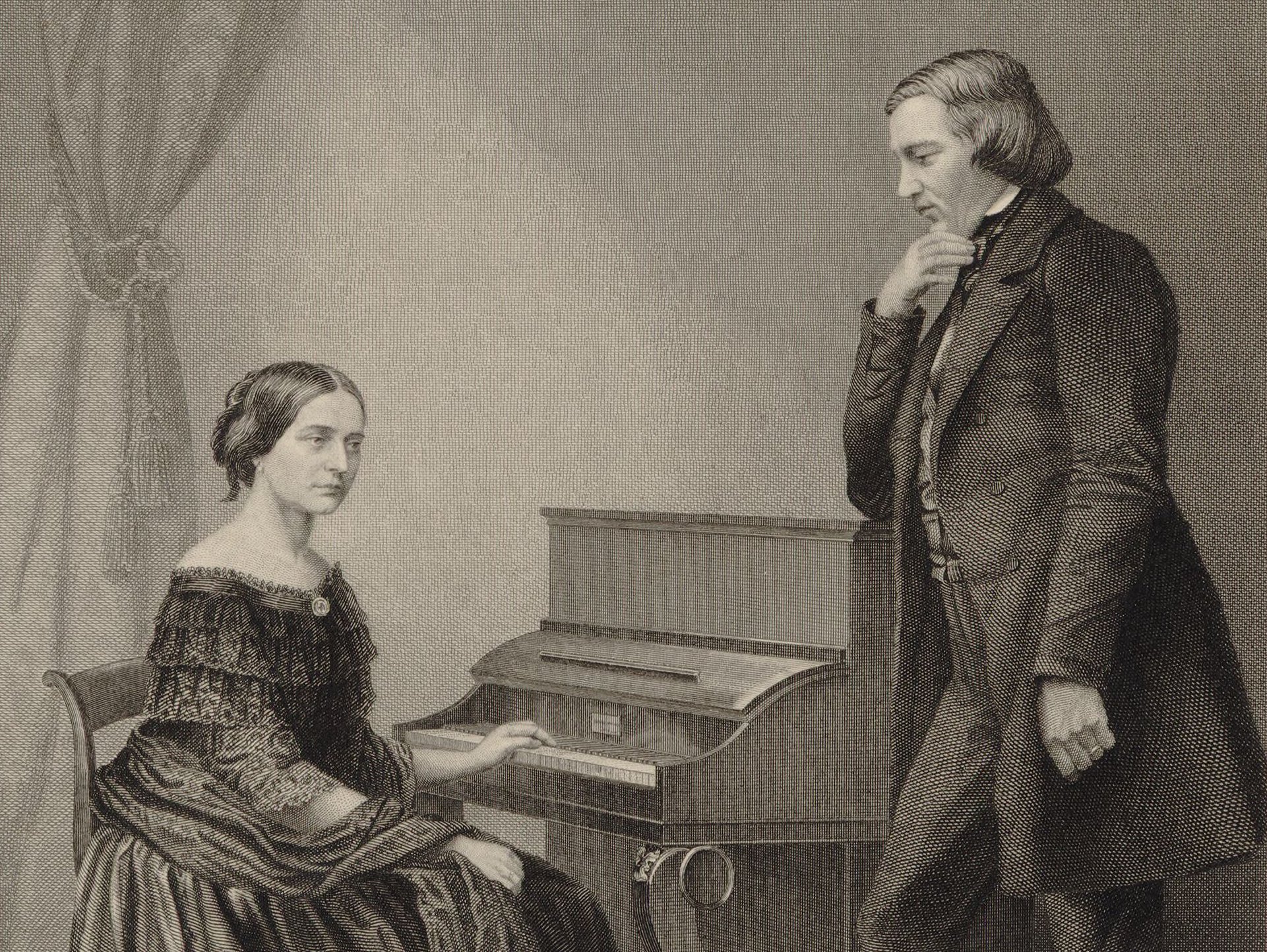 Clara Schumann sitting on the piano (left), Robert Schumann is standing next to her and looking towards her (right).