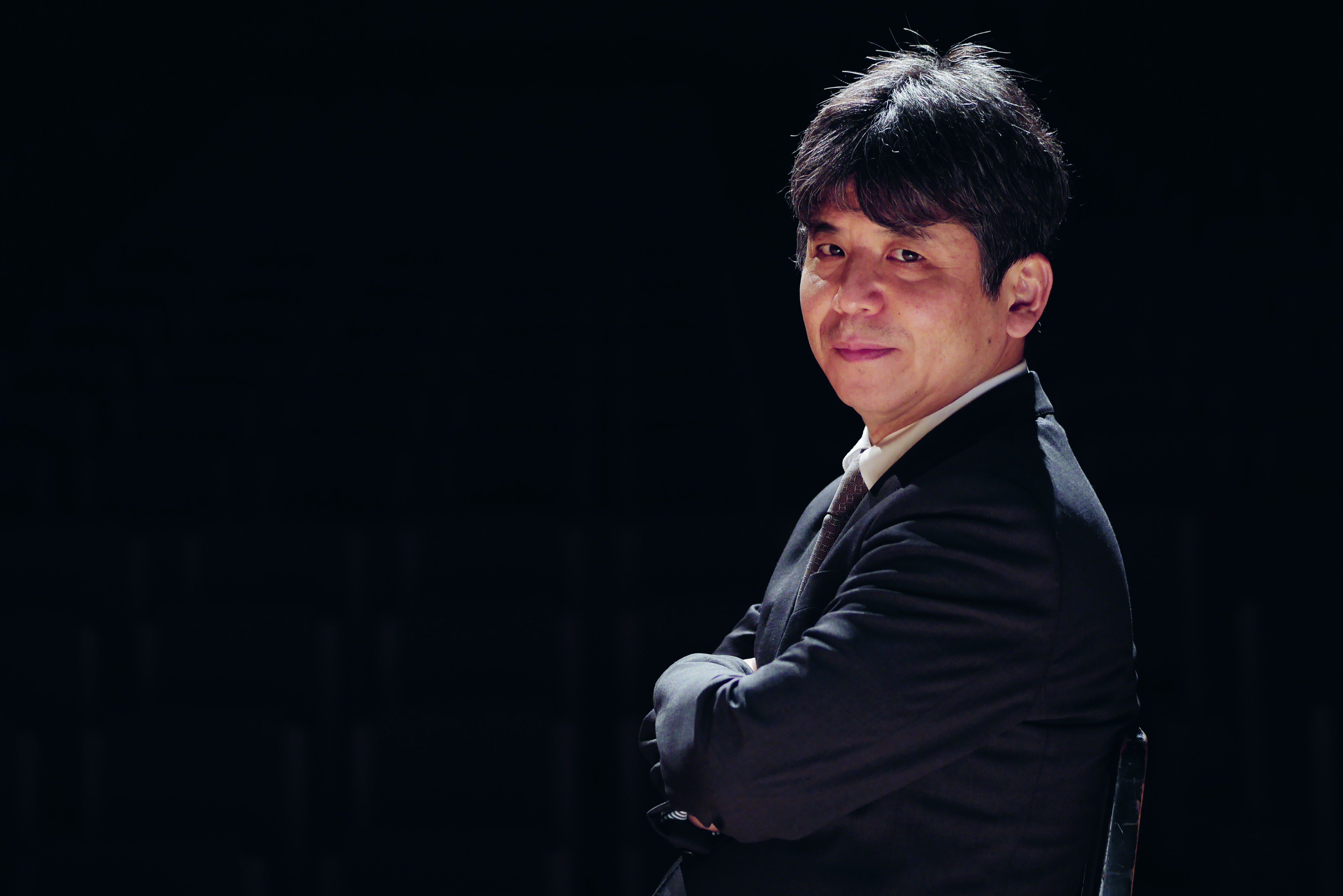 Portrait photo of Toshio Hosokawa.