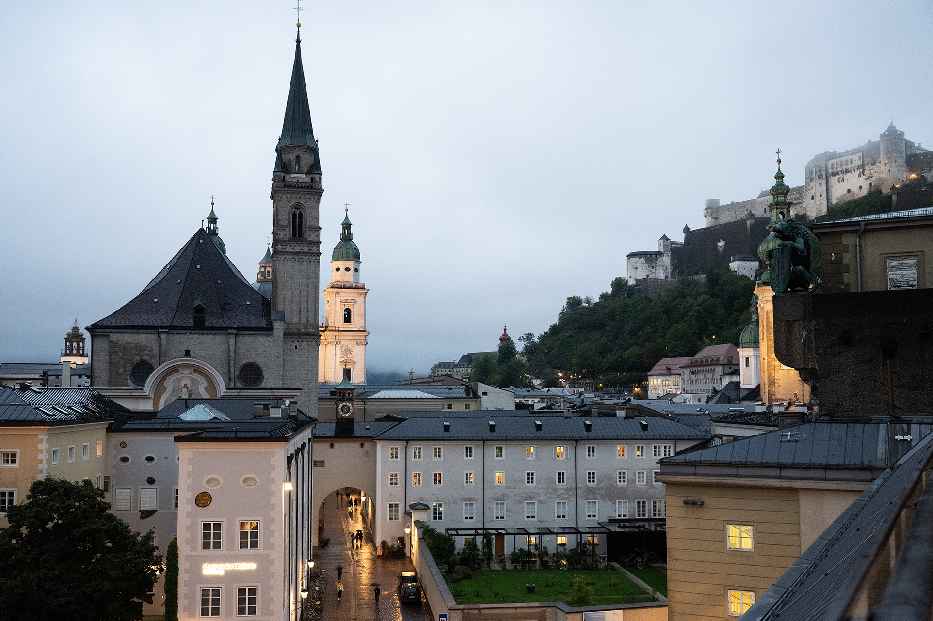 City view of Salzburg with the castle in the back almost dark and rainy